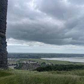 A verified photo of a coastal lookout pinned to the map